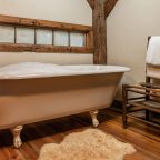 Warm bubbly bathtub in the Woodwork Shop room