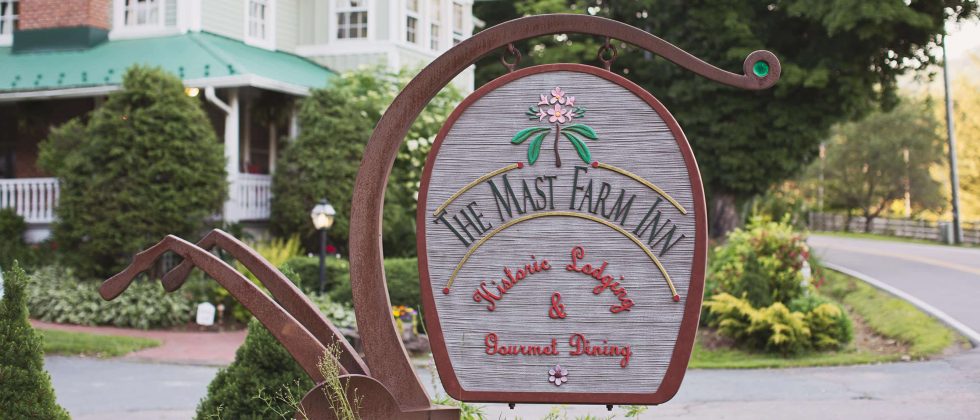 Sign outside of the Mast Farm Inn