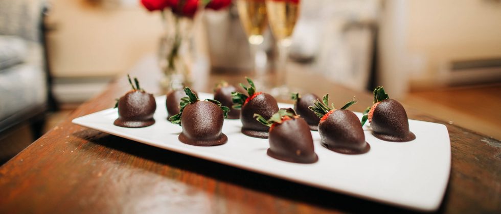 Chocolate covered strawberries on a plate