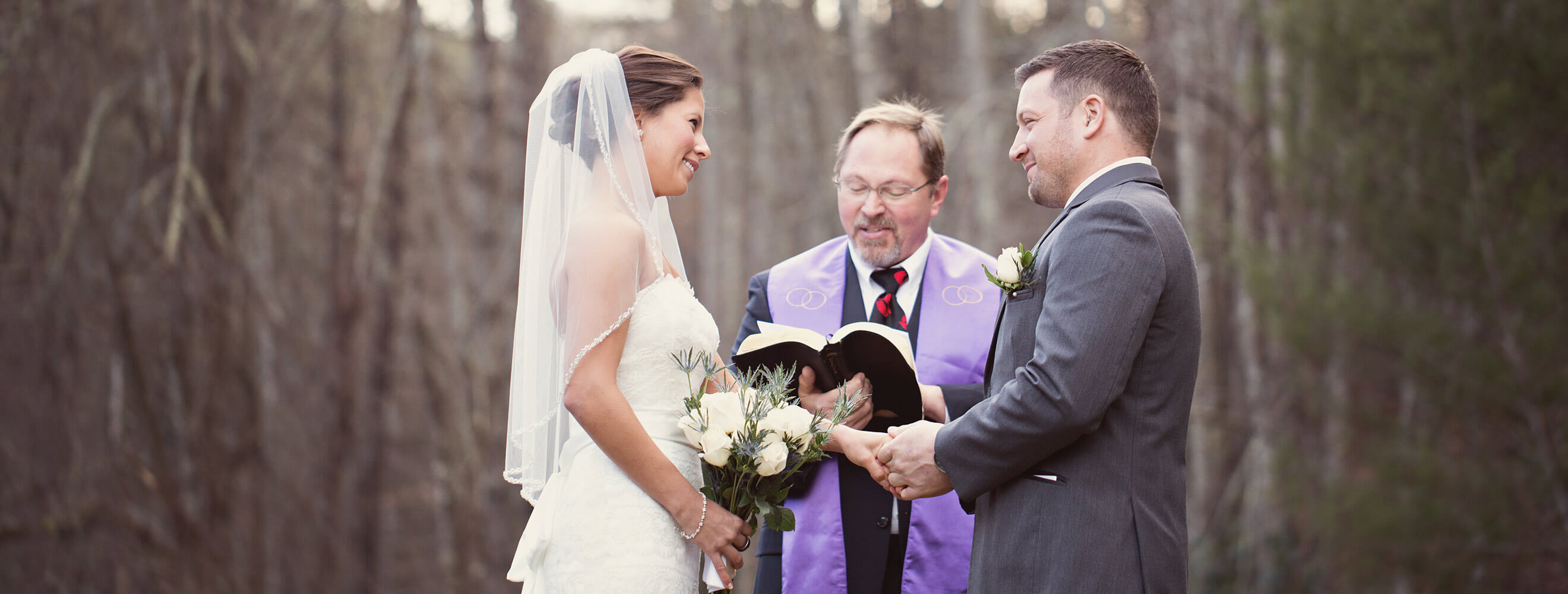 Elopement ceremony - couple holding hands