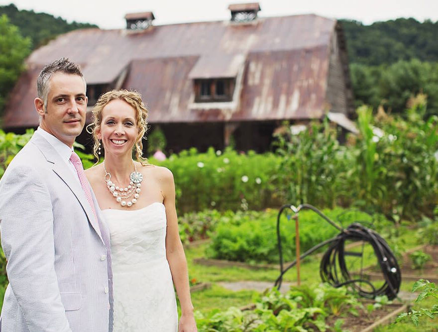 Bride and Groom in front of The Barn