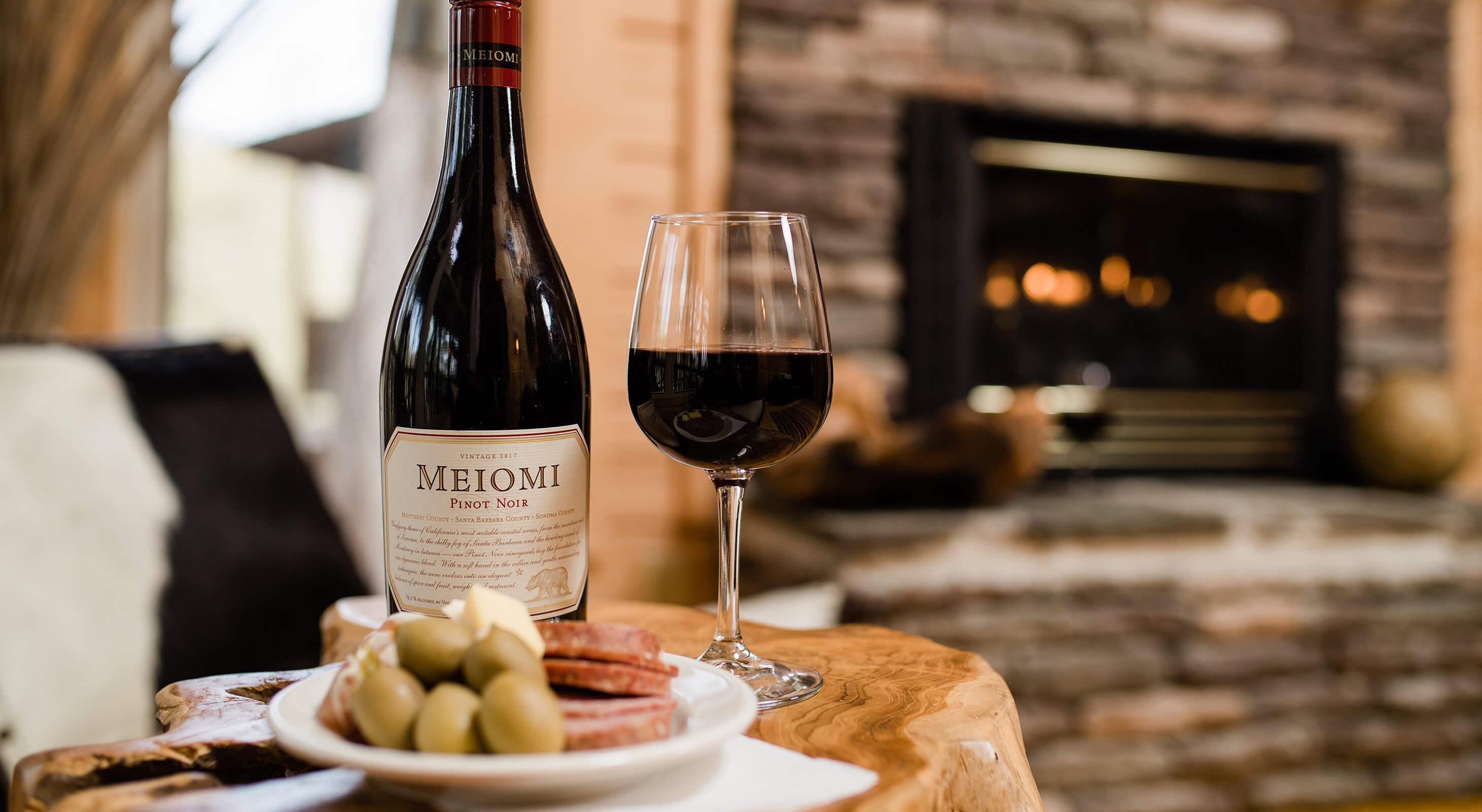 Glass of wine by the fireplace at a B&B in North Carolina