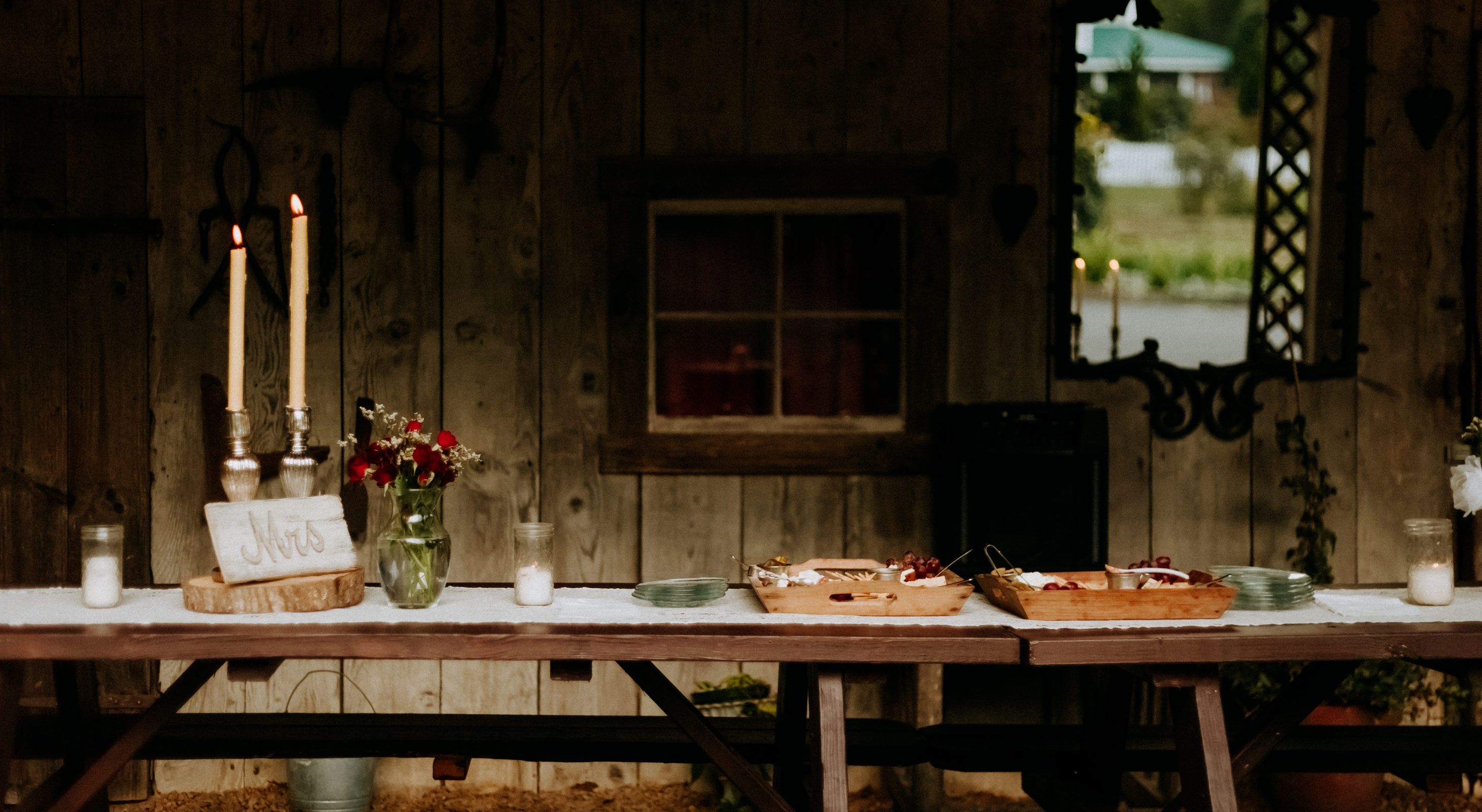 Table set up with elegant decorations and plates for a wedding